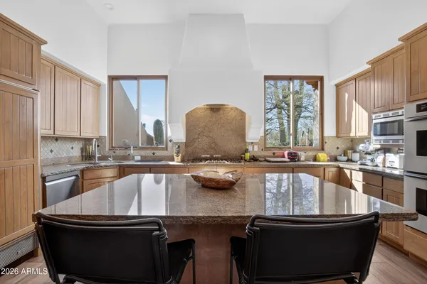 a bedroom with a bed and a walk in closet