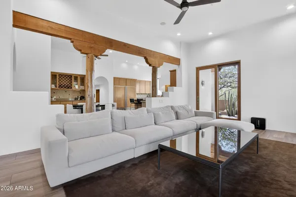 a living room with furniture and a window