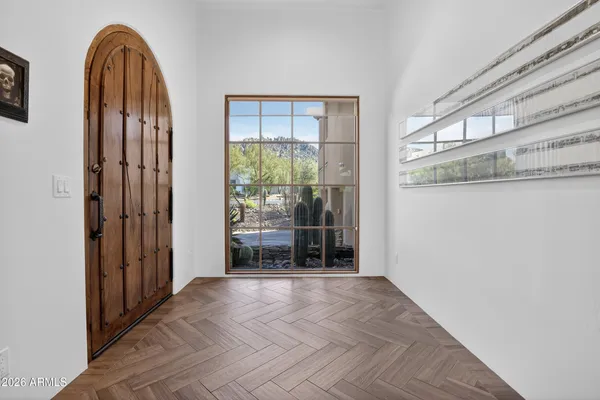 a living room with furniture and a gate