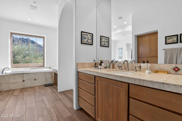 a view of a swimming pool with chairs in patio