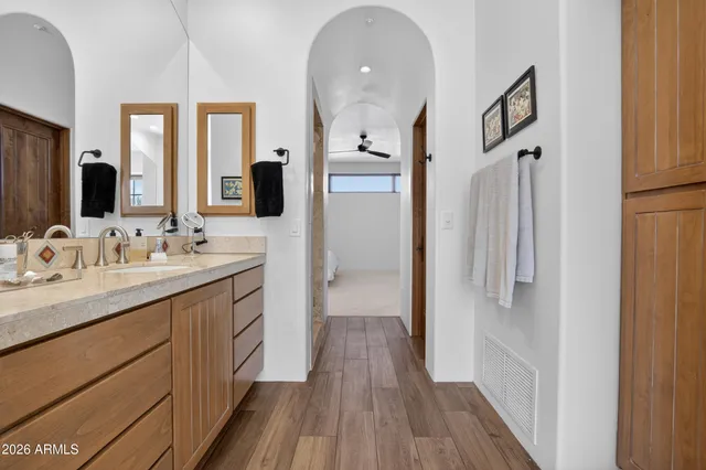 a front view of a house with swimming pool having outdoor seating