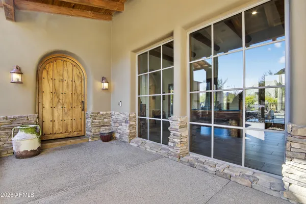 a kitchen with stainless steel appliances a sink stove and cabinets