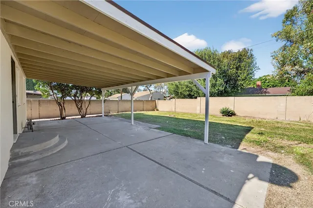 a view of backyard with green space