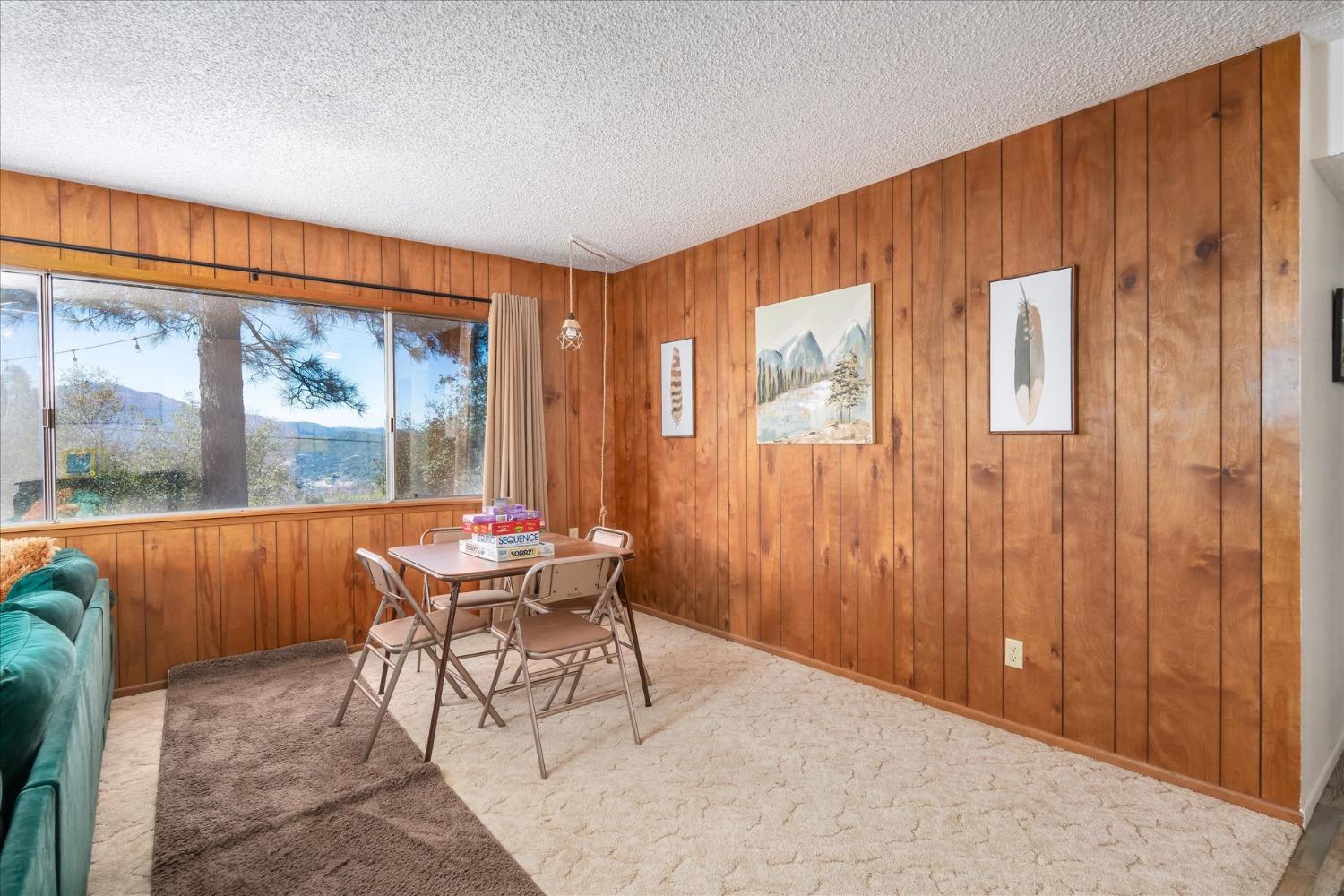 42324 Buckeye Road Oakhurst, CA 93644 - Photo 12 of 45 a dining room with furniture and window