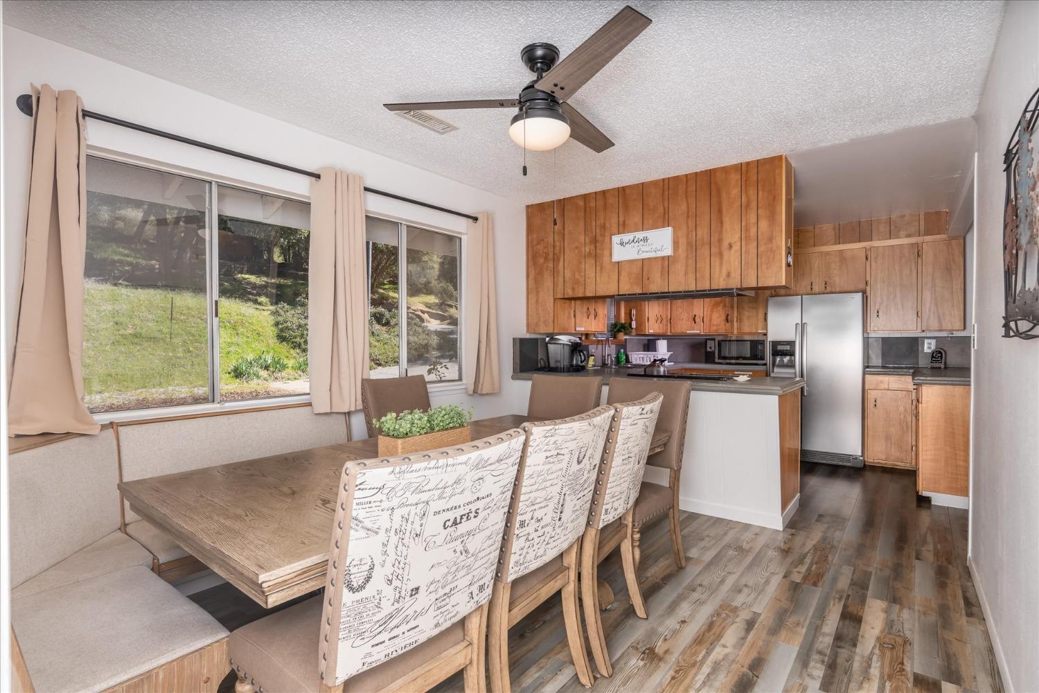 42324 Buckeye Road Oakhurst, CA 93644 - Photo 18 of 45 a living room with stainless steel appliances granite countertop furniture and a kitchen view