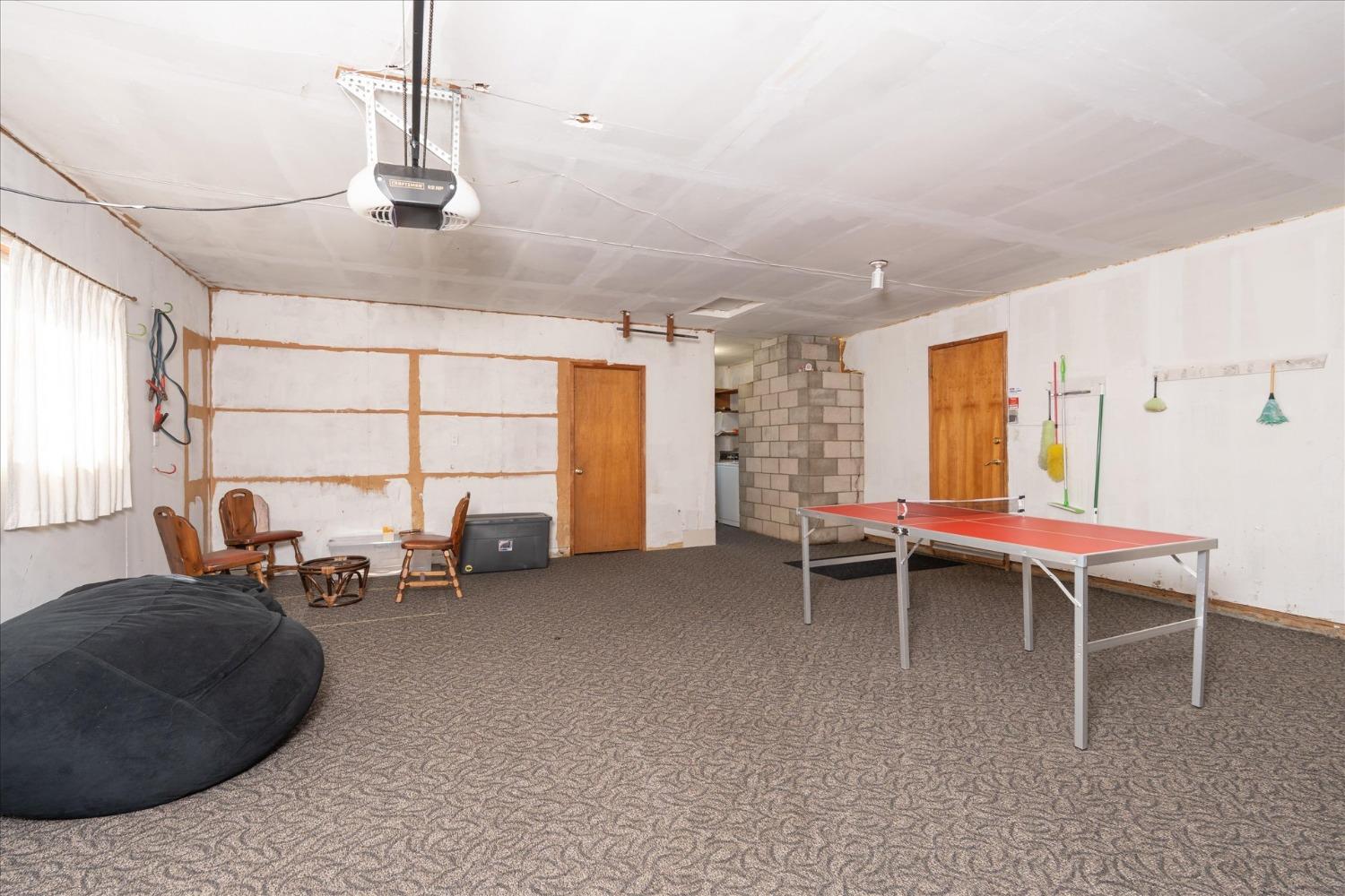 42324 Buckeye Road Oakhurst, CA 93644 - Photo 30 of 45 a living room with furniture and a window