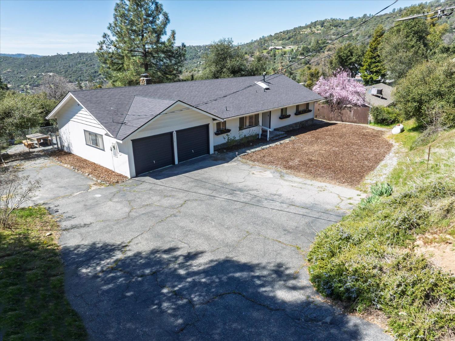 42324 Buckeye Road Oakhurst, CA 93644 - Photo 5 of 45 a aerial view of a house