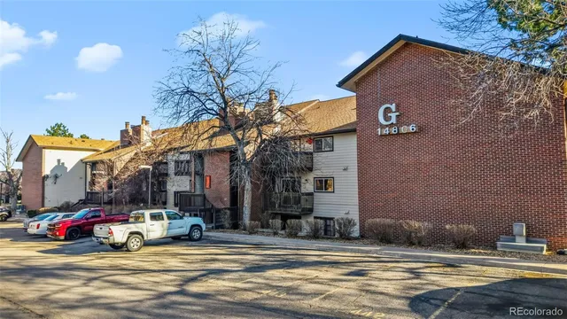 a view of street with parked cars