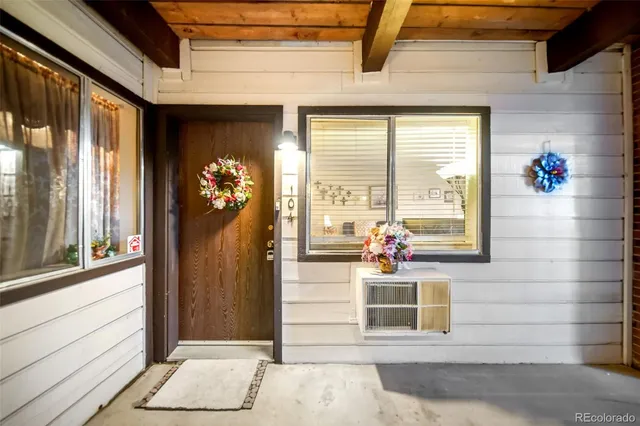 a front view of a house with a porch