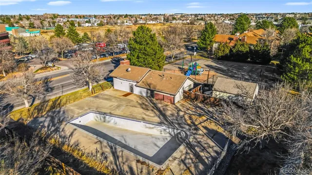 an aerial view of a house with a ocean view