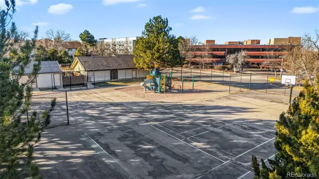 a view of a building with trees