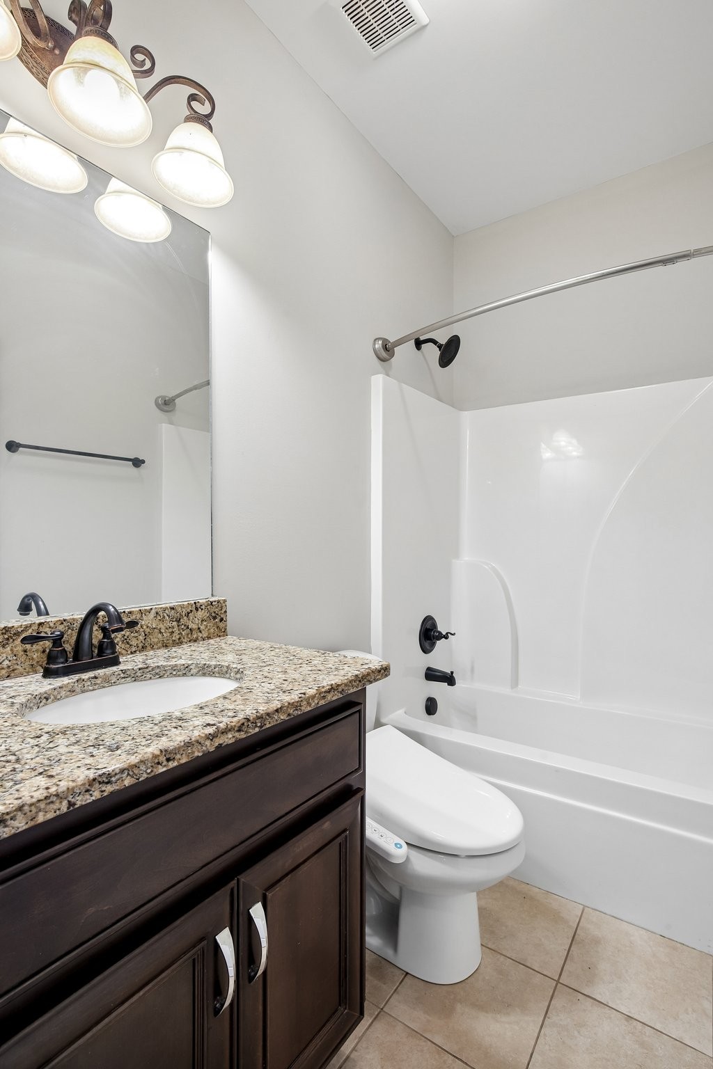 316 Amazonway Ridge Lascassas, TN 37085 - Photo 14 of 36 a bathroom with a granite countertop bathtub sink vanity mirror and toilet