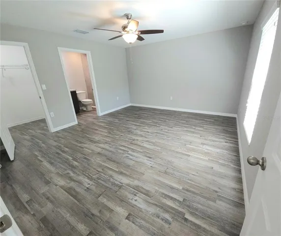 a view of a room with racks on the wall