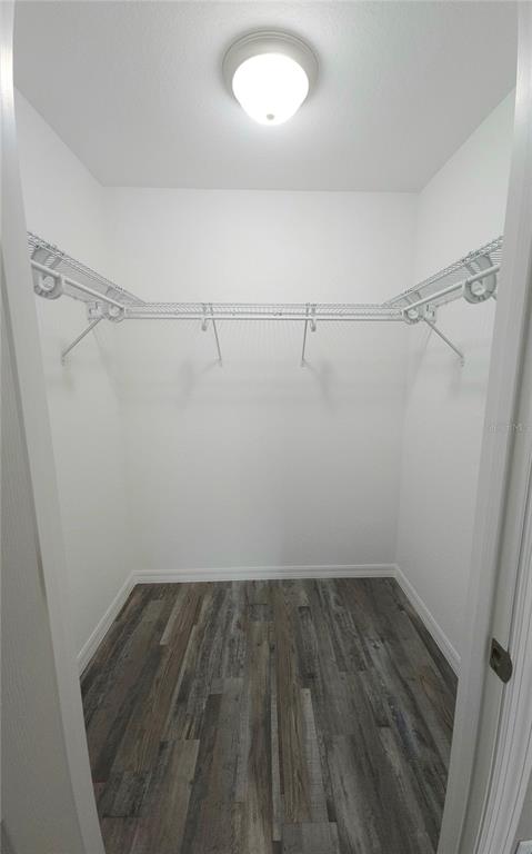 6312 Southwest 134th Loop Ocala, FL 34473 - Photo 9 of 13 a view of a room with racks on the wall