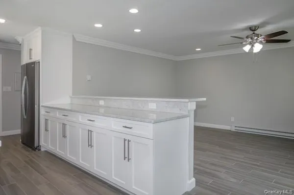 a view of a kitchen with a sink