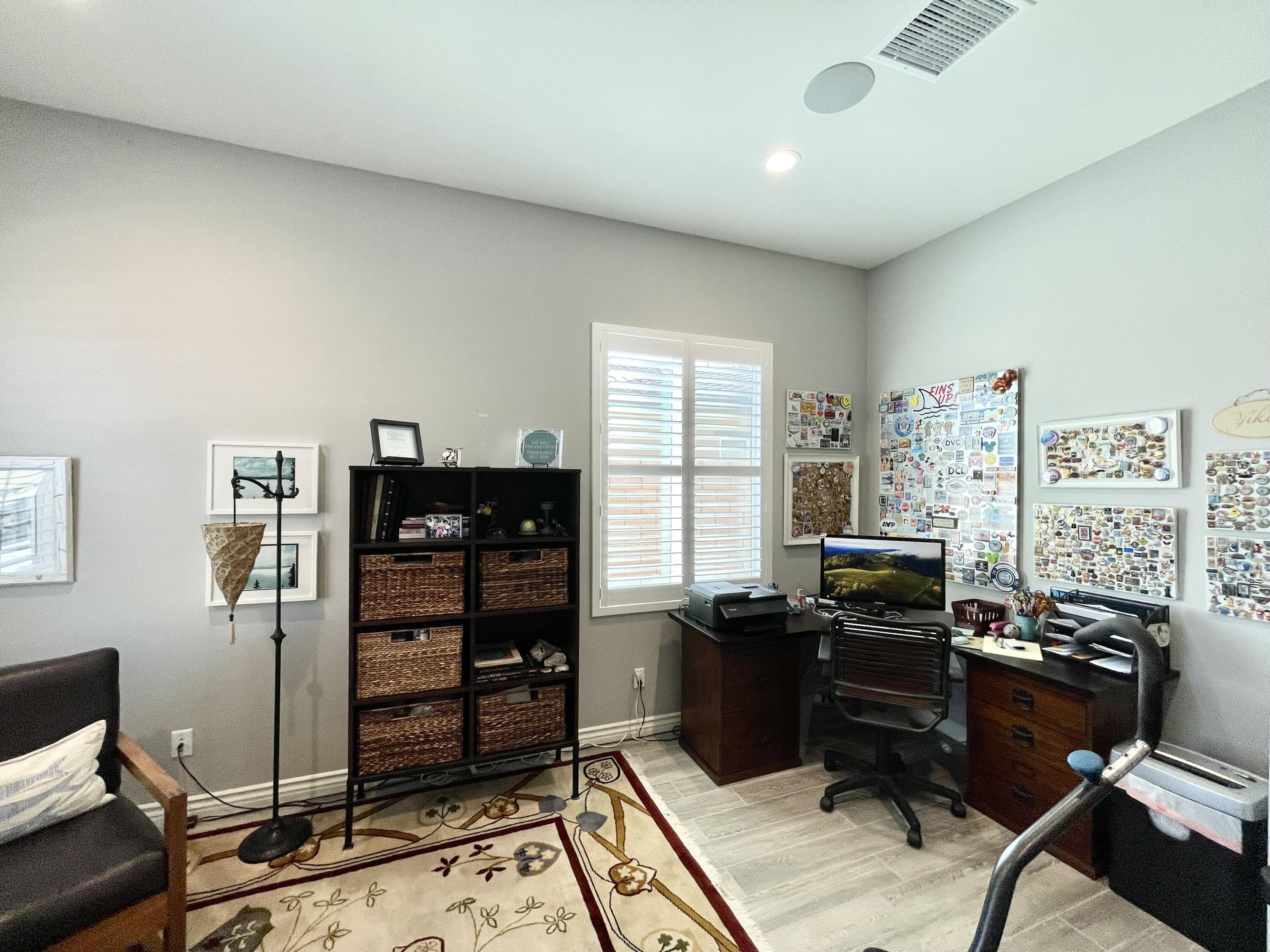 43573 Adria Drive Indio, CA 92203 - Photo 31 of 63 a view of a workspace with furniture and a window