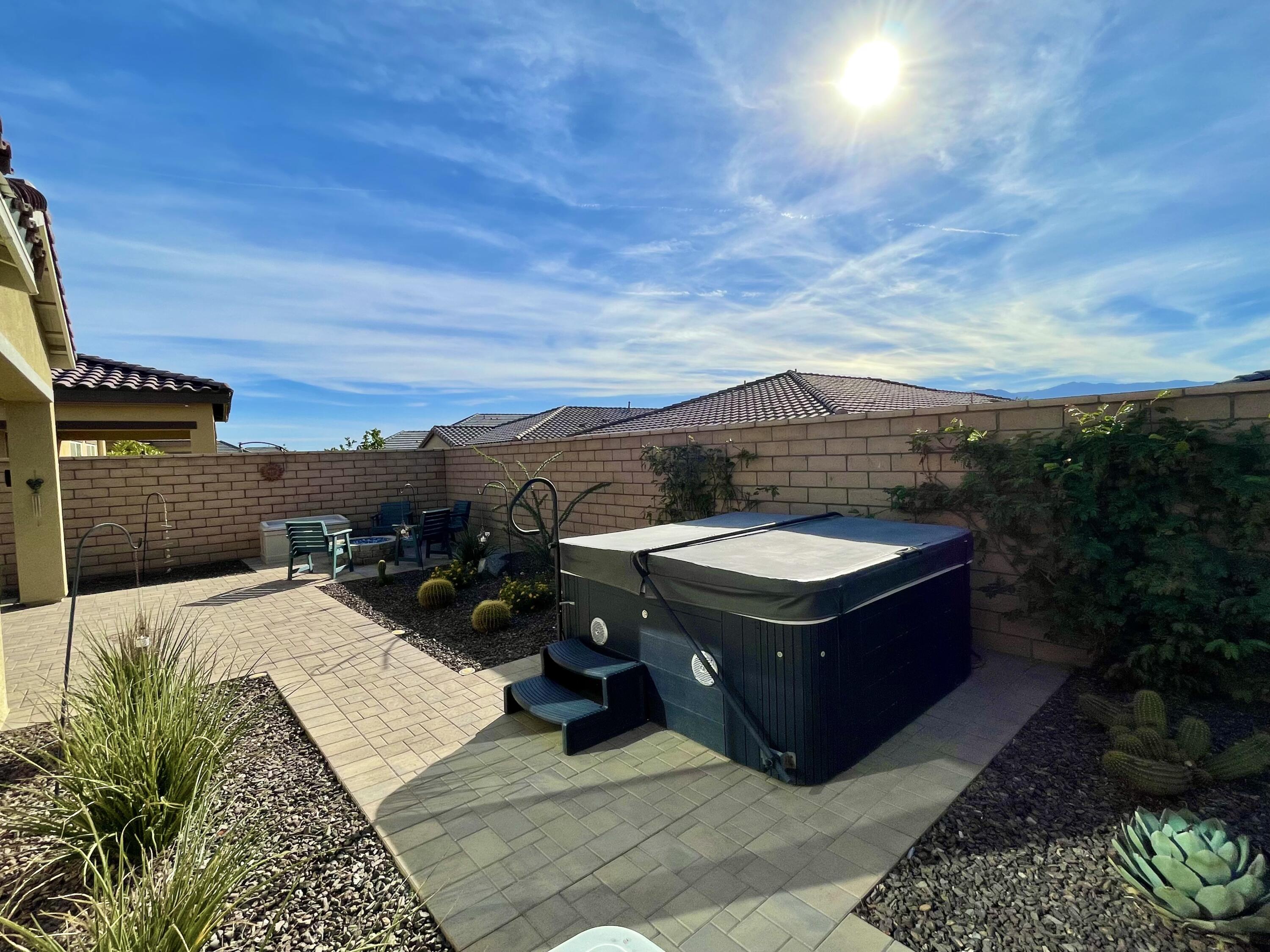 43573 Adria Drive Indio, CA 92203 - Photo 38 of 63 a view of a couches in patio of the house
