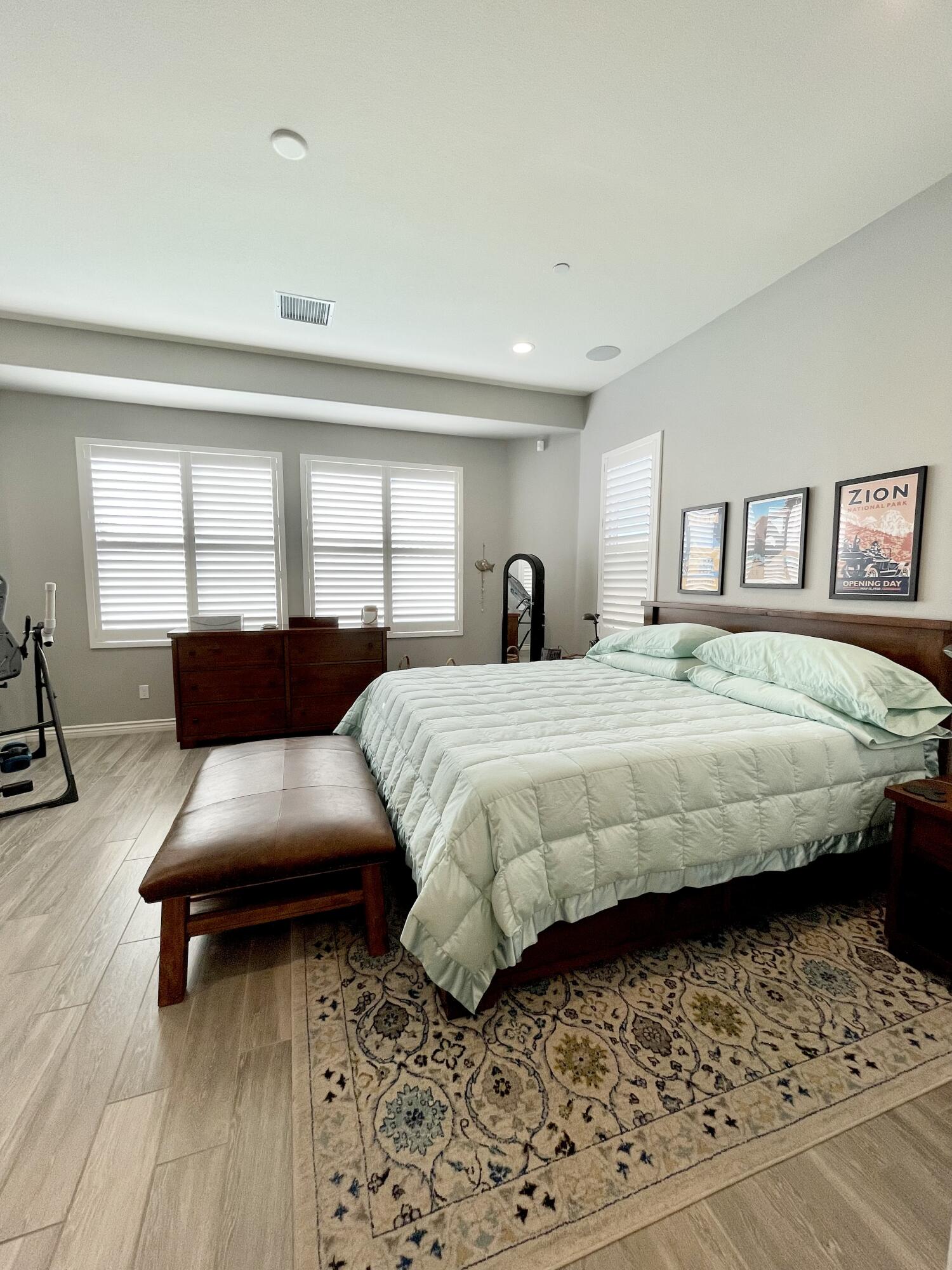 43573 Adria Drive Indio, CA 92203 - Photo 5 of 63 a bedroom with a bed couch and a window