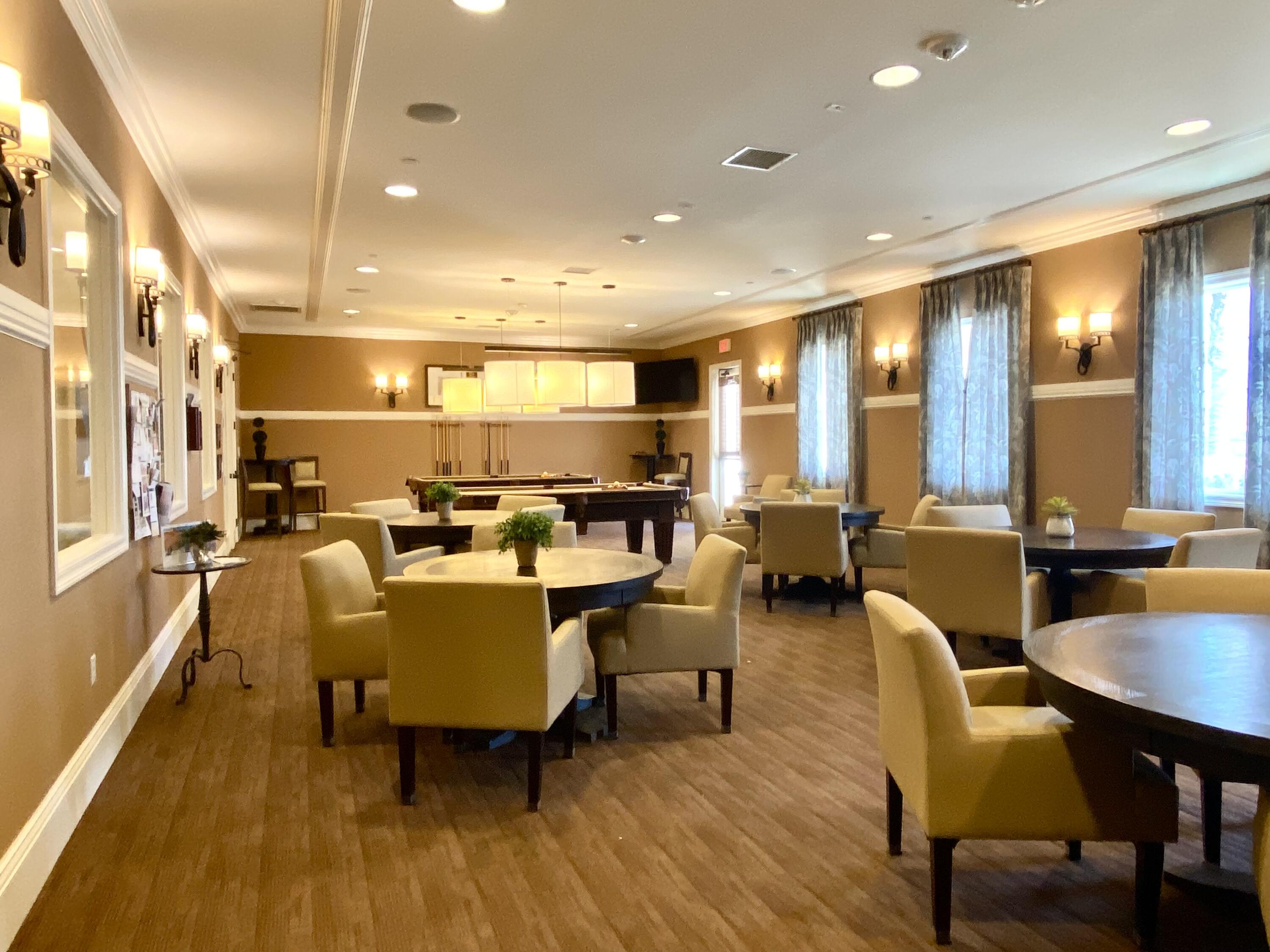 43573 Adria Drive Indio, CA 92203 - Photo 53 of 63 a dining room with furniture and wooden floor