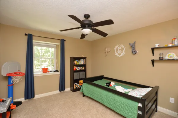 a room with furniture and a window