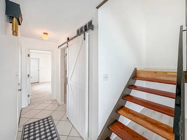 a view of staircase with white walls and white walls