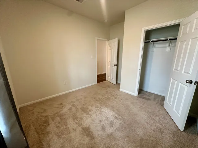 an empty room with a door