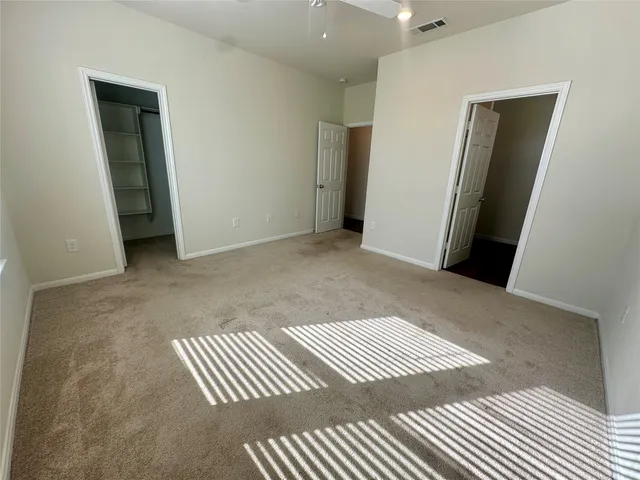 a view of an empty walk in closet