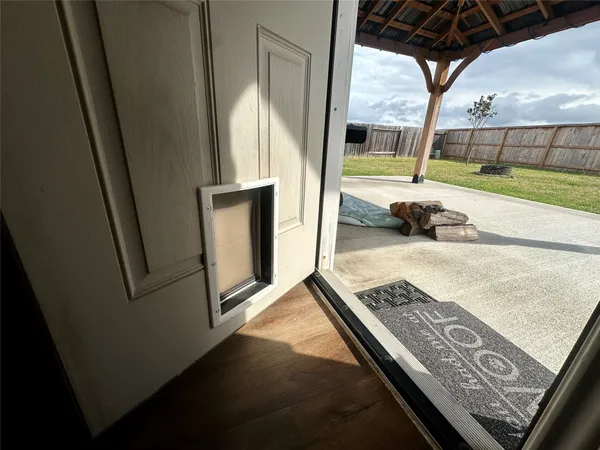 a view of a backyard of the house