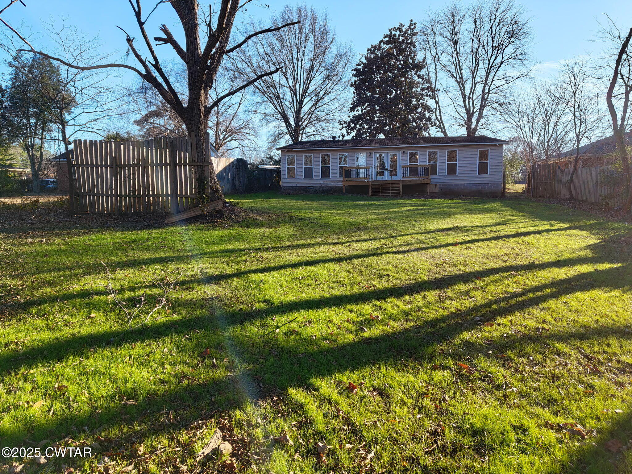 49 Primrose Drive Jackson, TN 38305 - Photo 2 of 20 a view of a house with a yard