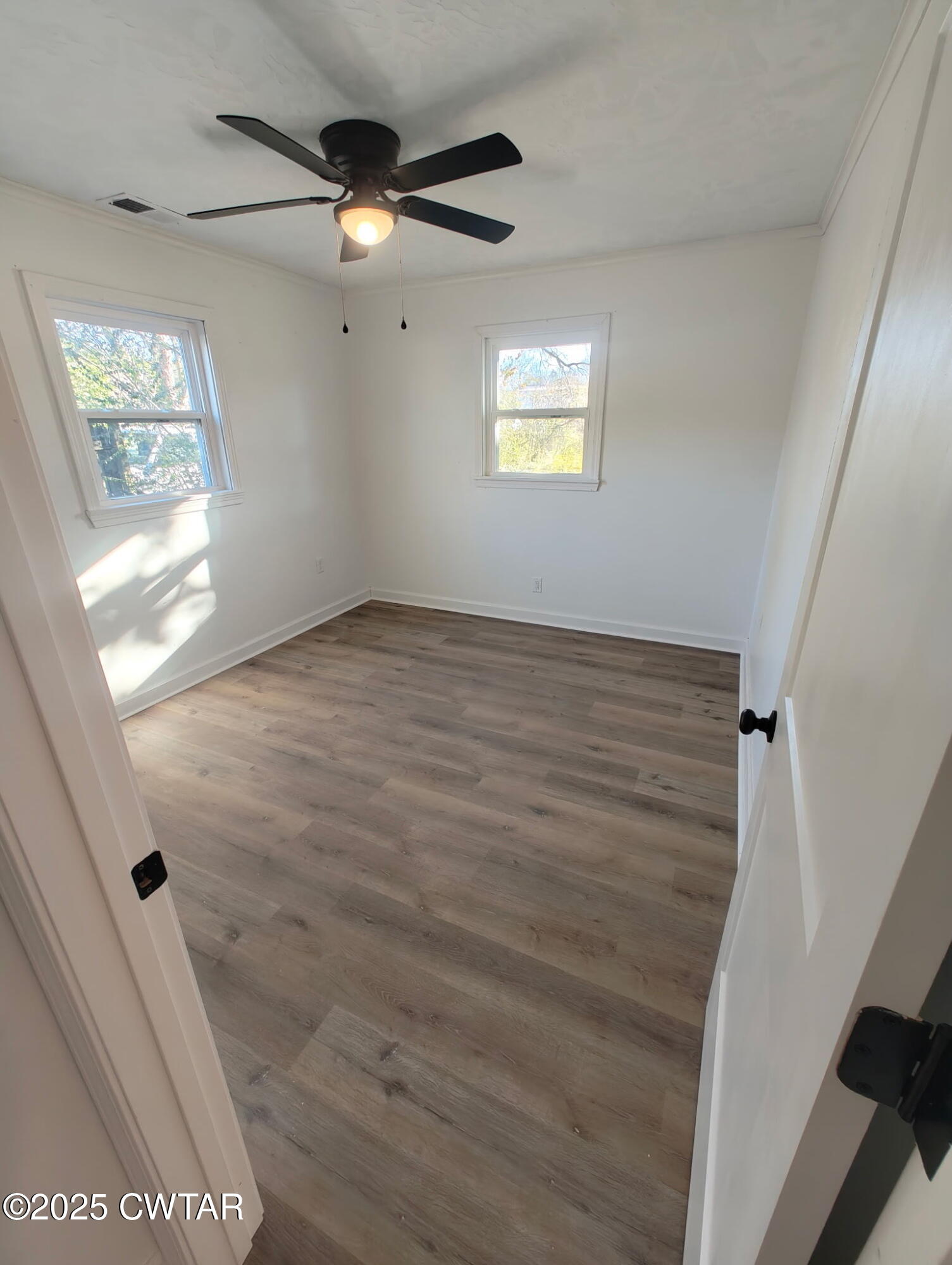 49 Primrose Drive Jackson, TN 38305 - Photo 7 of 20 a view of an empty room with a window