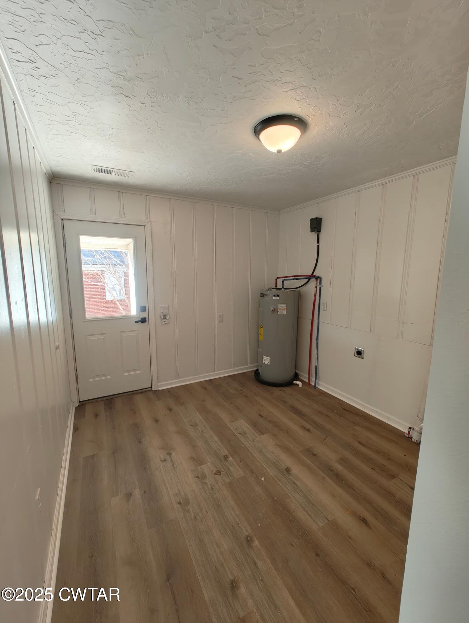 49 Primrose Drive Jackson, TN 38305 - Photo 10 of 20 a view of an empty room with a window