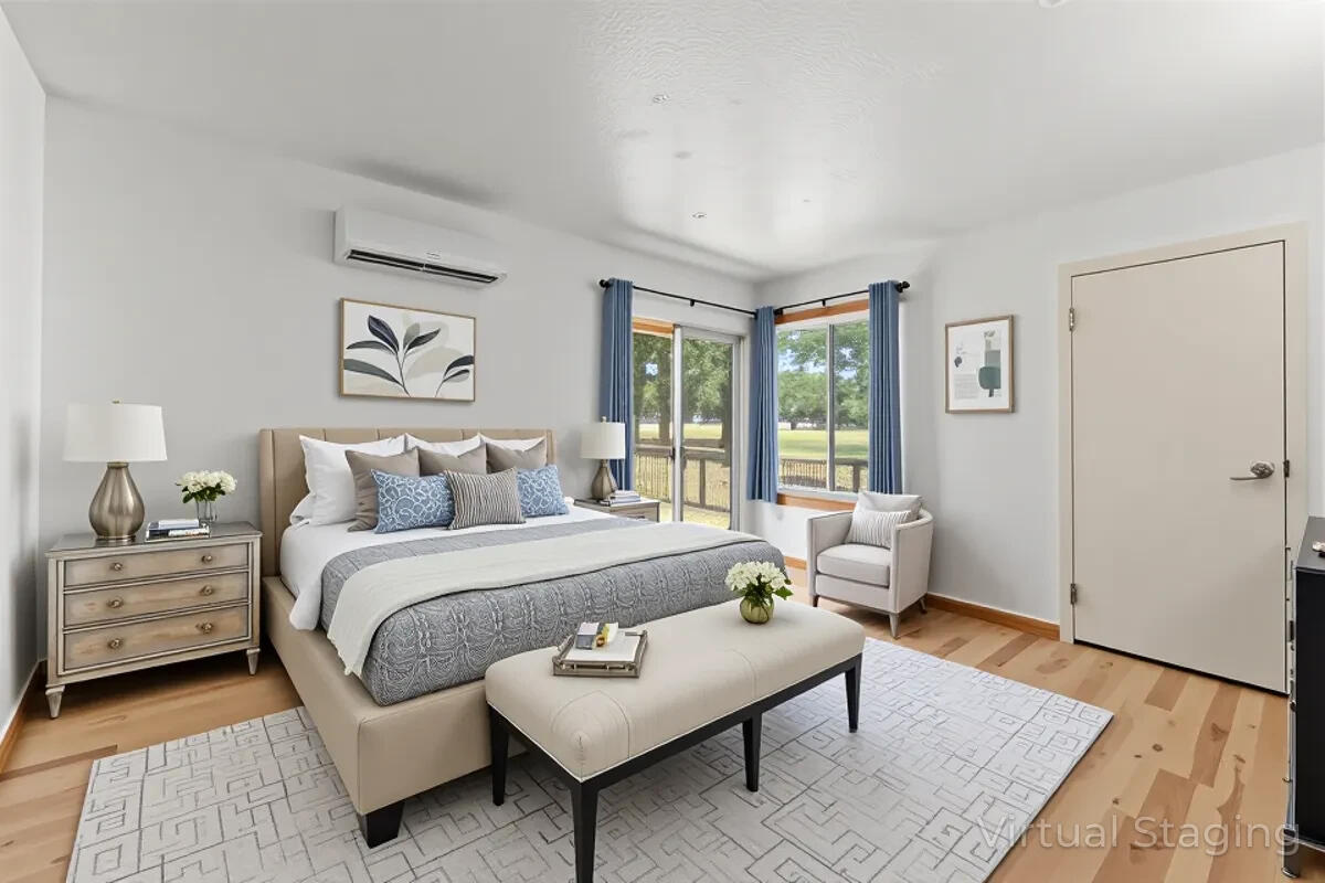 13185 Montecito Road Red Bluff, CA 96080 - Photo 10 of 36 a spacious bedroom with a bed and a couch