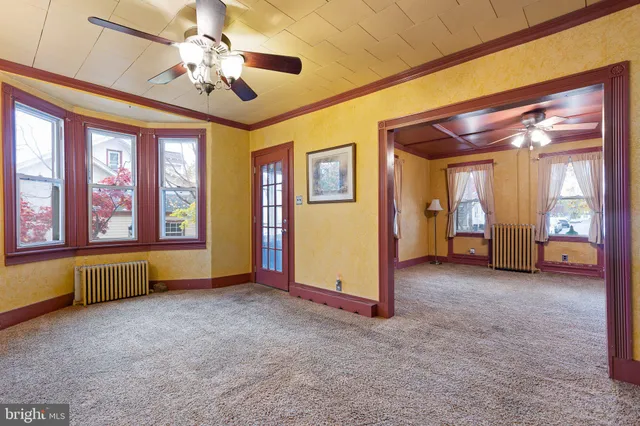 an empty room with windows