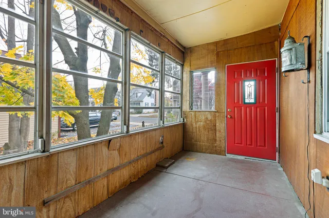 a view of an entryway with a large window