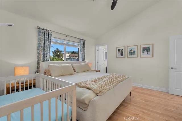 a bedroom with furniture and windows
