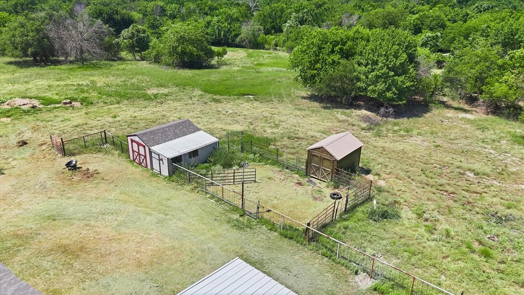 892 Highland Circle Springtown, TX 76082 - Photo 4 of 40 Fenced area for barn and storage.