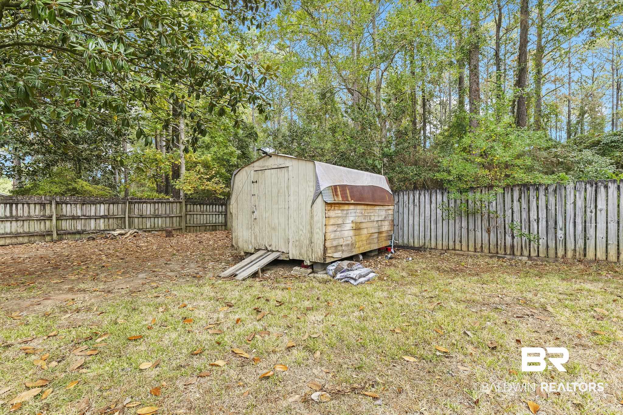 474 Ridgewood Drive Daphne, AL 36526 - Photo 53 of 57 View of outbuilding featuring a yard