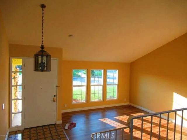 a view of a room with windows