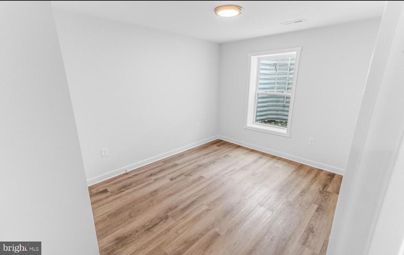 123 Hank Aaron Road Berkeley Springs, WV 25411 - Photo 23 of 32 Bright and airy blank canvas room.