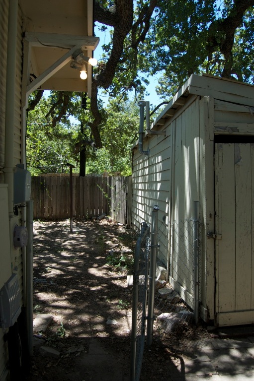 403 East 35th Street Austin, TX 78705 - Photo 11 of 14 a view of a house with a small yard