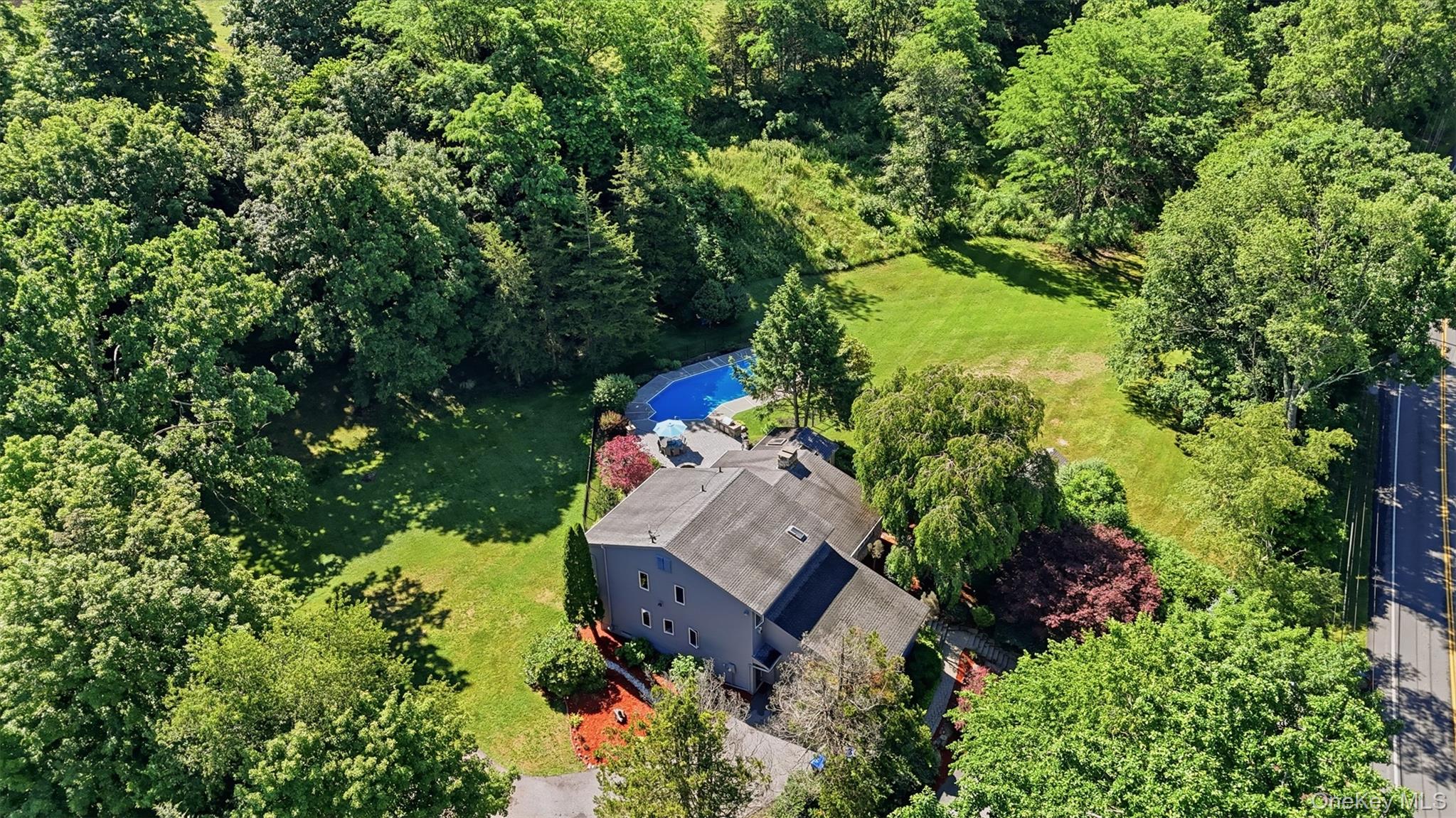 985 Craigville Road Chester, NY 10918 - Photo 29 of 36 Multi-level residence with an inground pool and surrounding patio