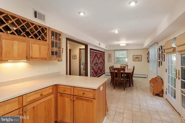 a view of a living room and dining room