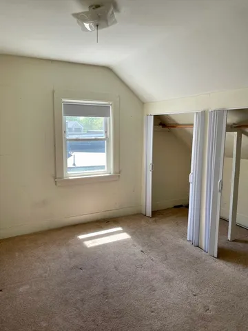 a view of a room with a window