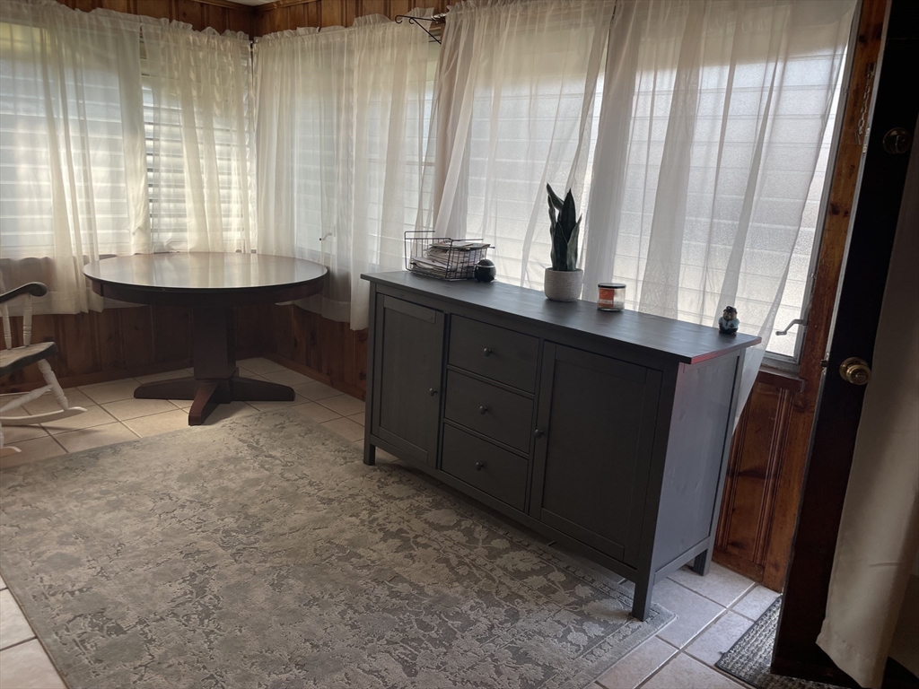 15 Green Street Reading, MA 01867 - Photo 27 of 34 a room with window and cabinet