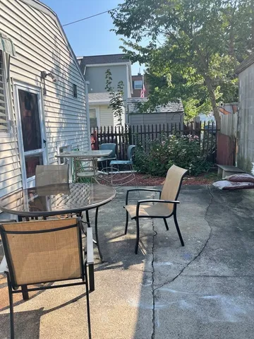 a kitchen with sink and cabinets