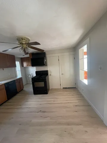 a view of a livingroom with furniture