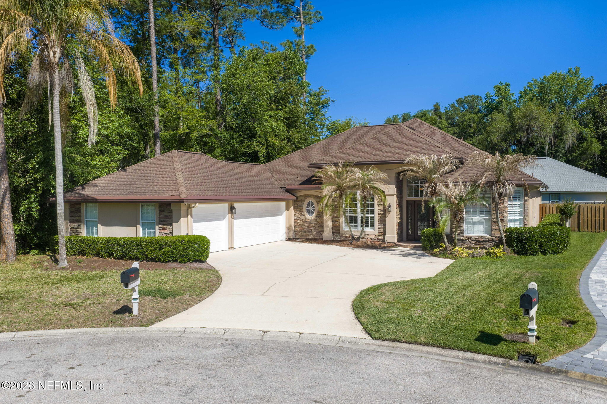 1600 Spring Water Court Fleming Island, FL 32003 - Photo 3 of 85 front view of a house with a yard