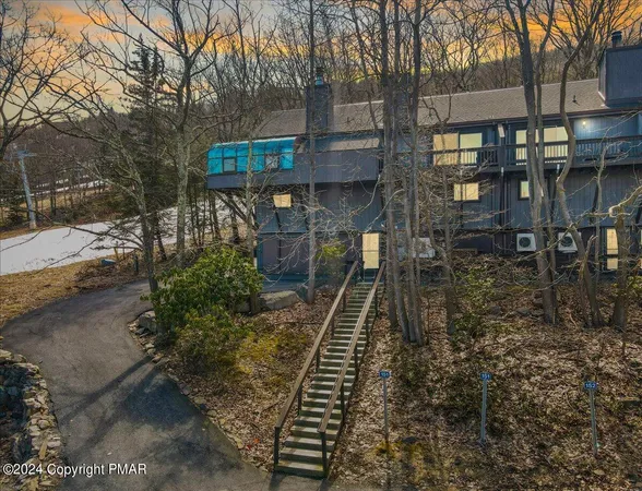 a house view with a backyard