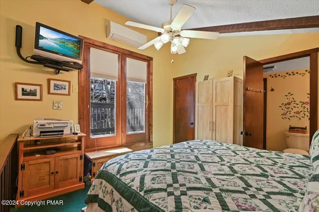 a bathroom with a sink a mirror and vanity