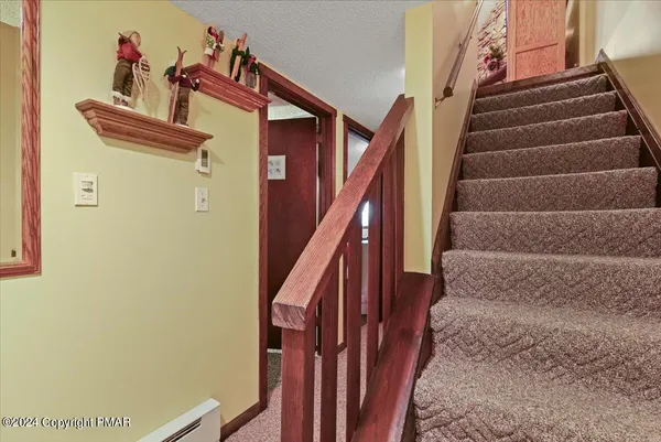a view of an entryway with staircase